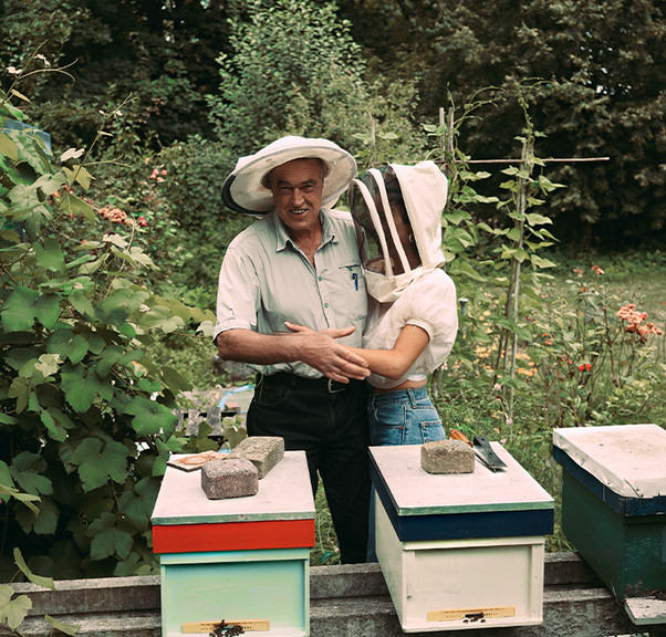 Negin & her father hugging in the Mirsalehi bee garden