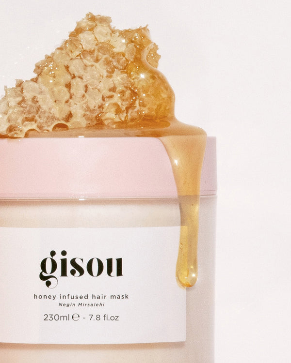 Honey Infused Hair Mask with honey dripping on top of the cap