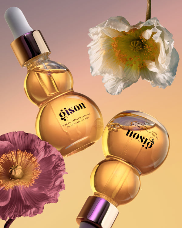 Honey Infused Face Oil on the background with fresh flowers