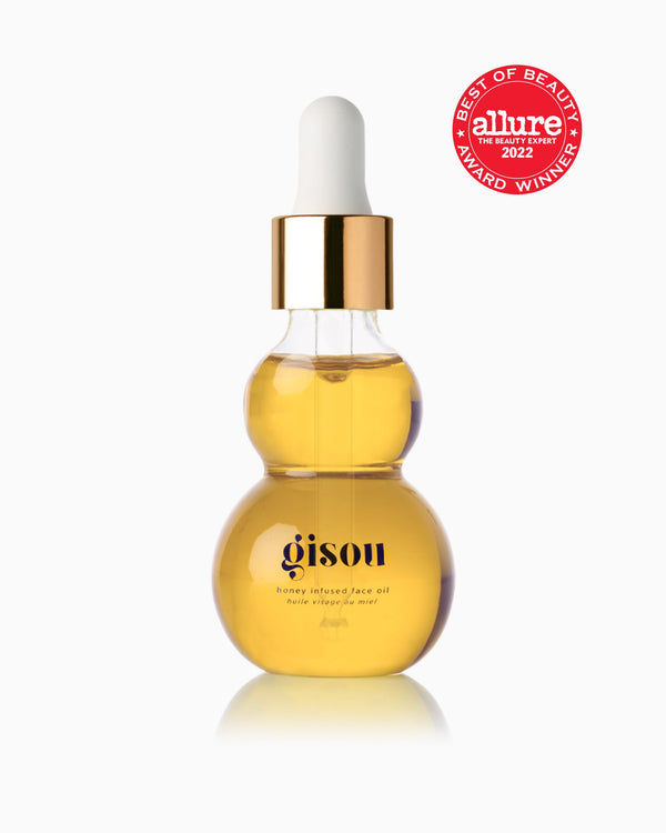 A bottle of Honey Infused Face Oil with award winner allure sticker